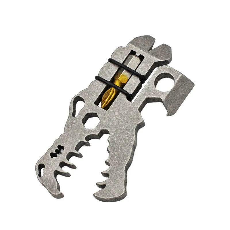 Grey TC4 titanium dinosaur head survival tool 78x42x5mm on a grey background