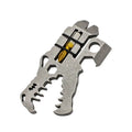 Grey TC4 titanium dinosaur head survival tool 78x42x5mm on a grey background