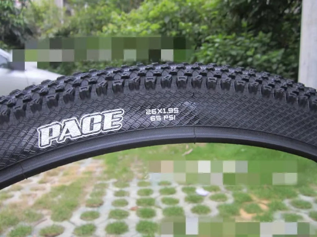 Ultralight puncture-proof mountain bike tyre showing tread pattern, available for 26, 27.5 and 29 inch wheels