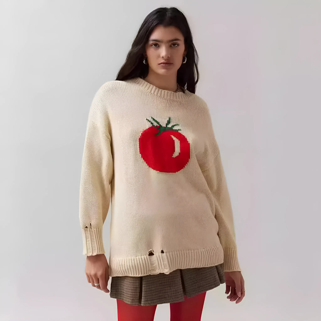 Women's beige acrylic jacquard loose-fitting pullover sweater with round neck and long sleeves.