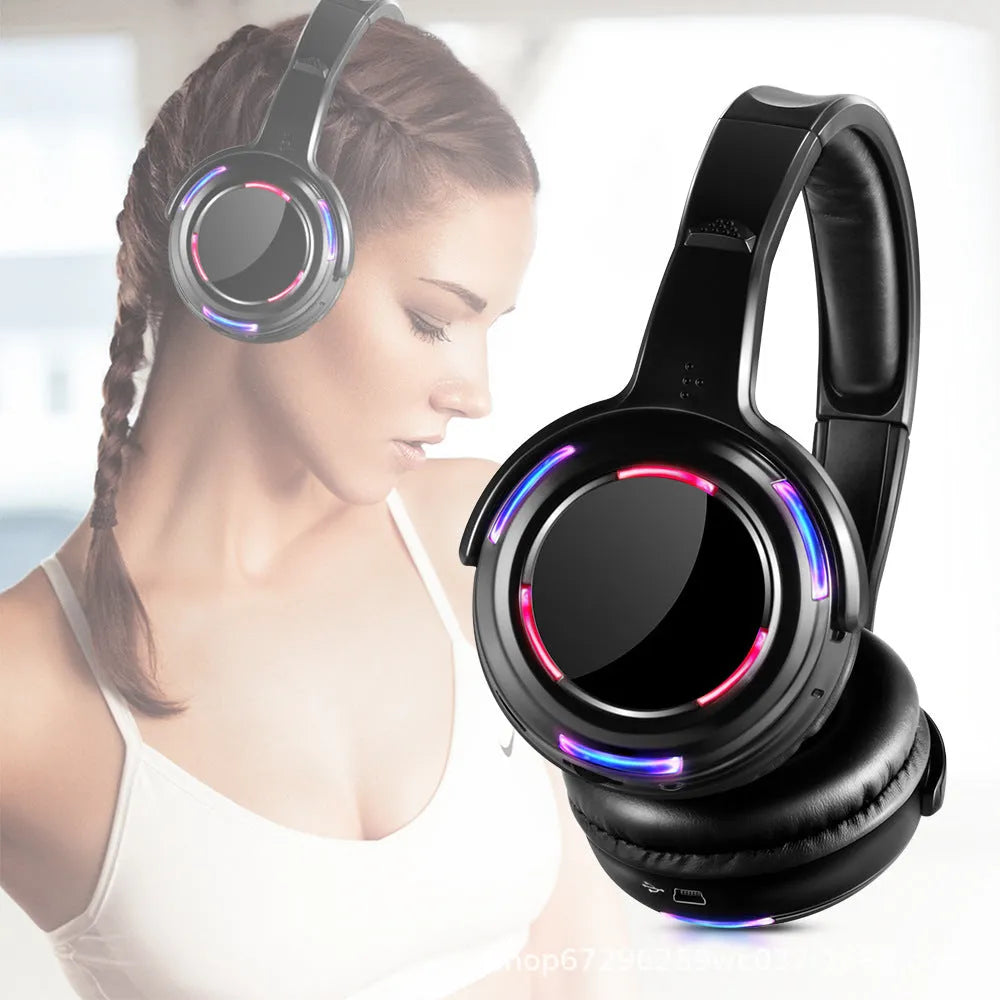 Black silent disco wireless headphones with head-mounted design and 3.5mm plug for event use