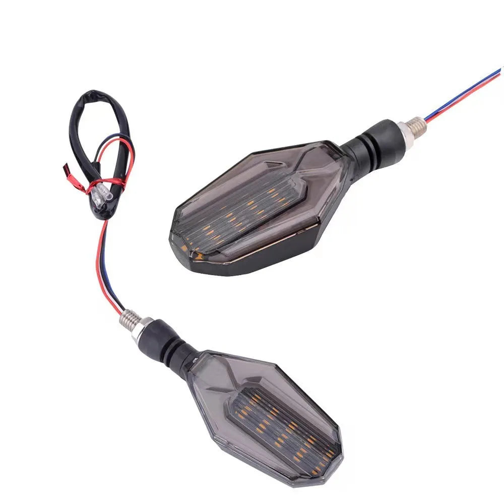 Motorcycle two-colour LED steering indicator signal set with light guide technology