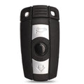 BMW semi-intelligent three-button remote car key fob on a grey background
