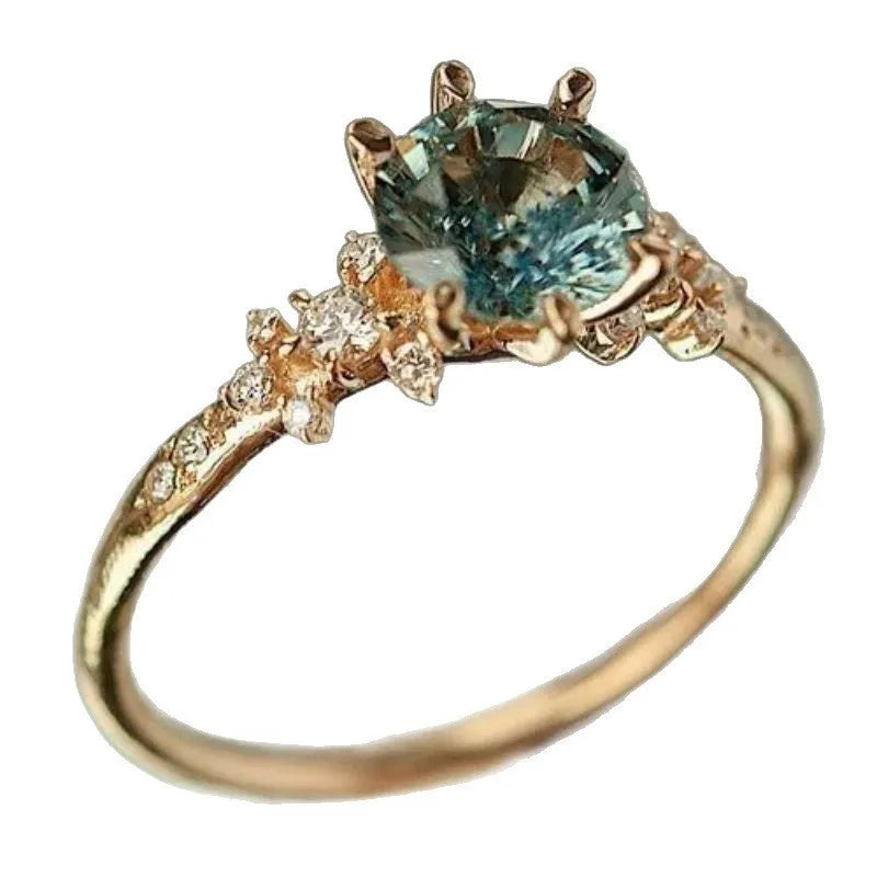 Gold plated claw setting zircon ring with chamfered square geometric pattern on band