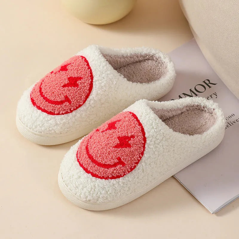 Women's plush cartoon-style home slippers with a round toe and PVC sole.