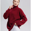 Women's loose fit high neck pullover sweater in solid sky blue colour, showing 3D textured pattern.