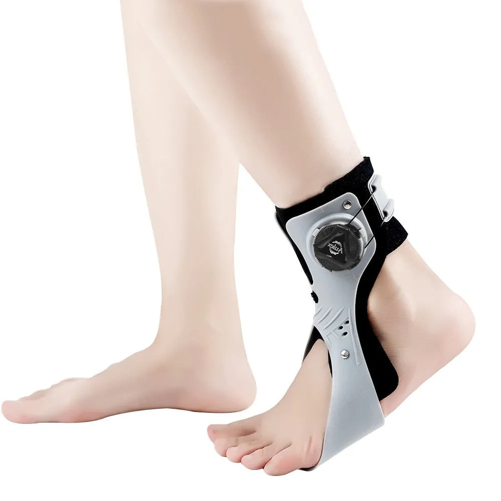 Grey ankle support brace with button fastening and airbag design for training and rehabilitation
