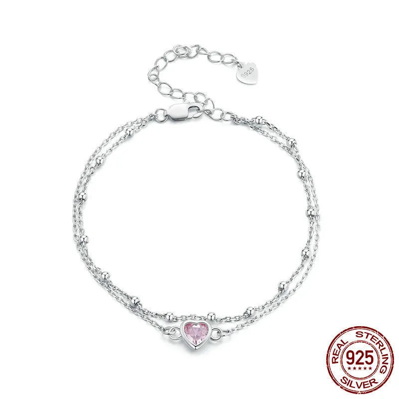 Sweet girlish 925 sterling silver bracelet with heart-shaped pendant on adjustable chain
