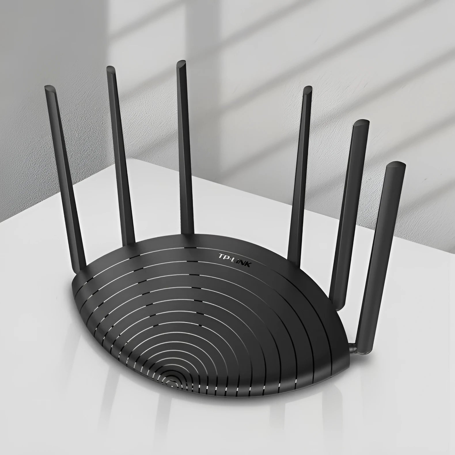TL-WDR7661 Gigabit Edition AC1900 wireless router with compact design and network cable