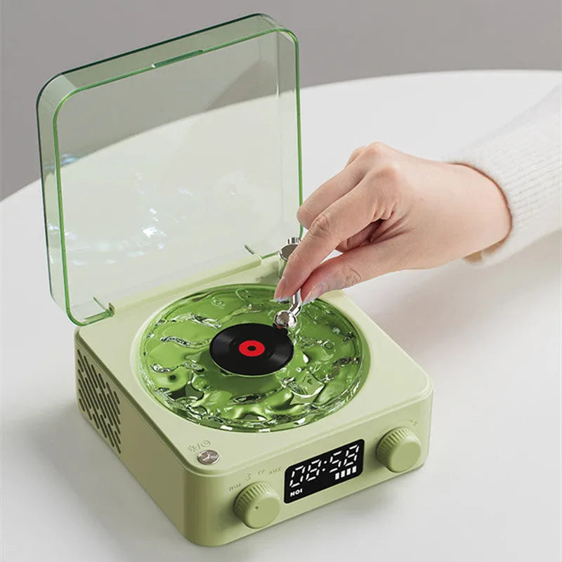 Retro Bluetooth speaker with rotating transparent turntable and RGB lighting projection