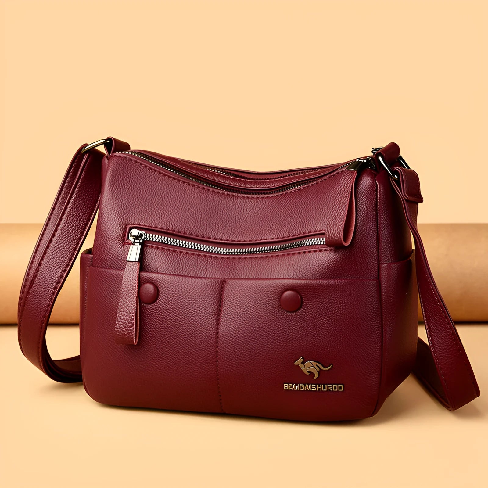 Soft PU leather crossbody shoulder bag in horizontal square shape with stitching details and multiple compartments