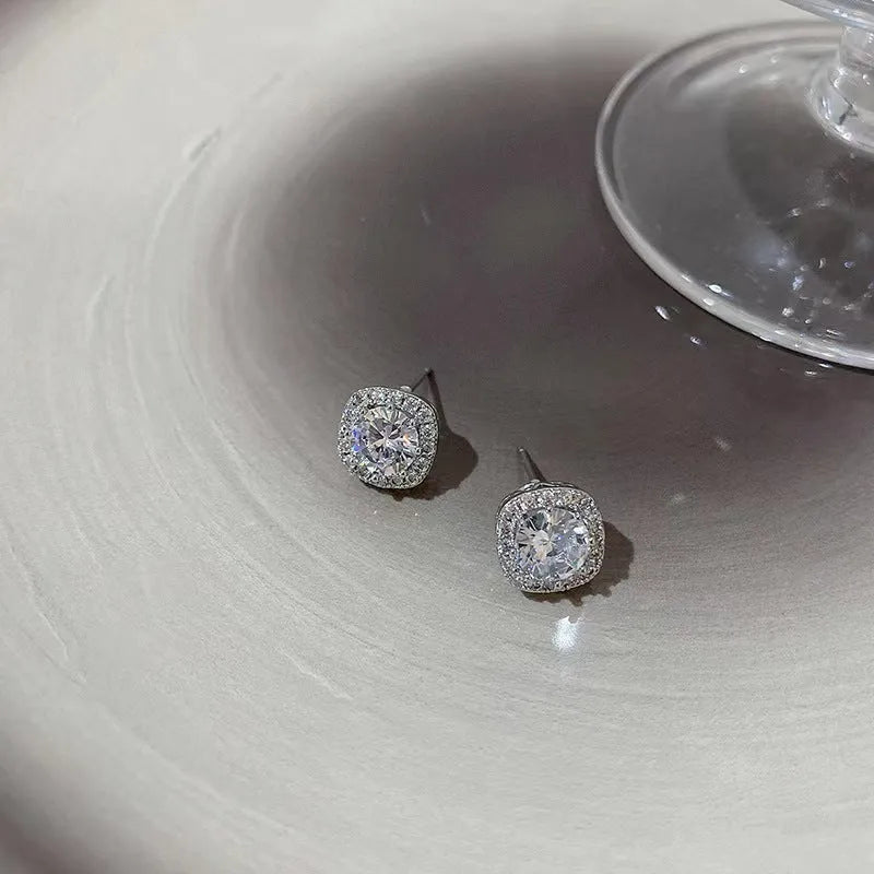 Square geometric earrings for women with a diamond detail in silver or gold colour.