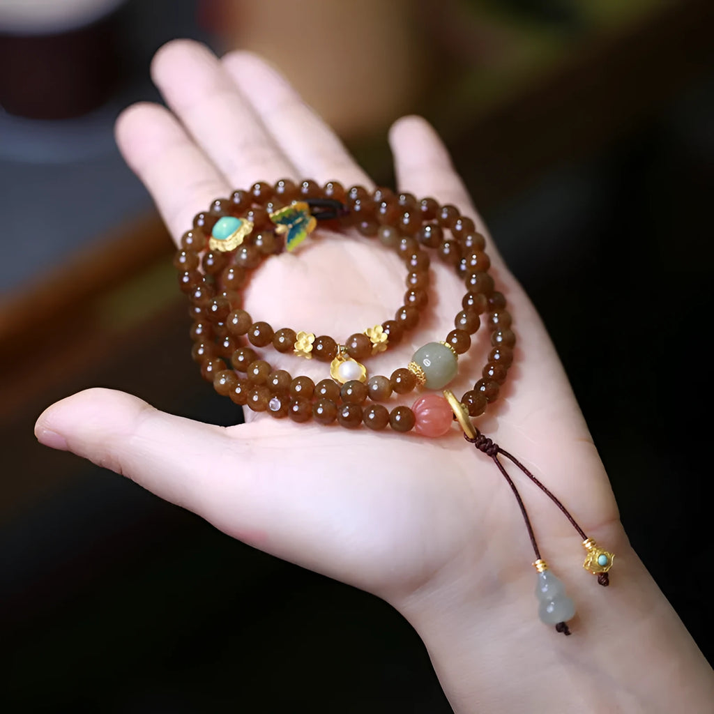 Brown jade Hetian three-ring bracelet with geometric design and silver-plated accessories