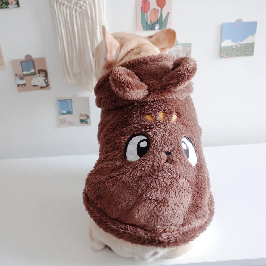 Cartoon embroidered coral velvet hooded pet vest in pink colour on a white background