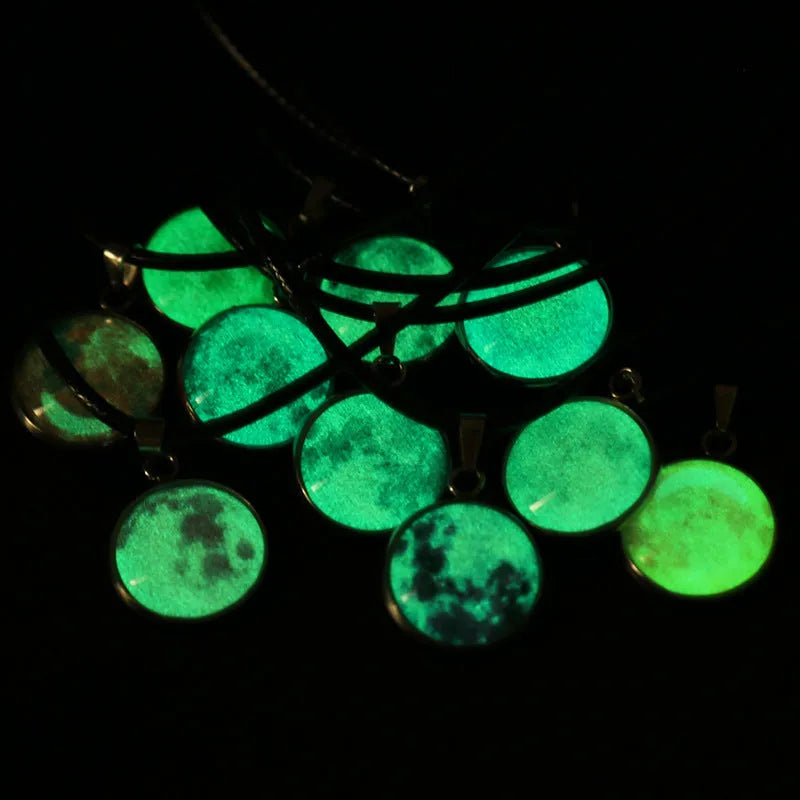 Luminous alloy necklace with a constellation-modelled glass pendant on an adjustable chain.