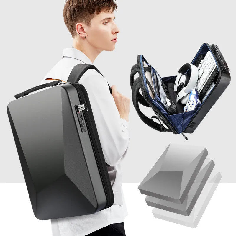 Men's large grey and black PC hard shell gaming backpack with double straps and a front lock.