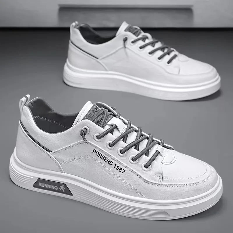 Men's grey canvas flats shoes with front lace-up stitching and shallow mouth design, side view