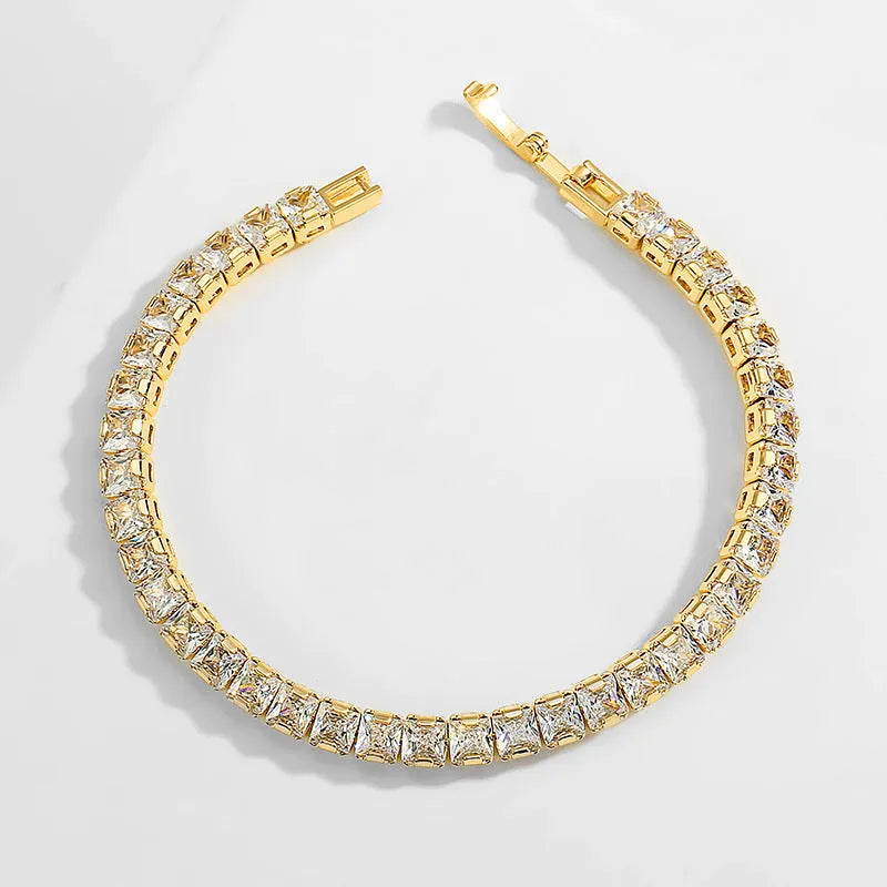 Women's simple diamond studded bracelet in gold finish with 4mm band width on white background