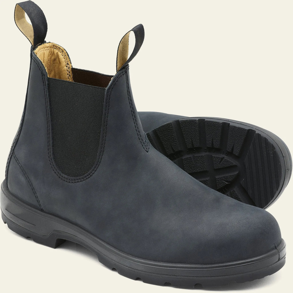 Vintage brown unisex Chelsea boots with car stitching and a low horse hoof heel.