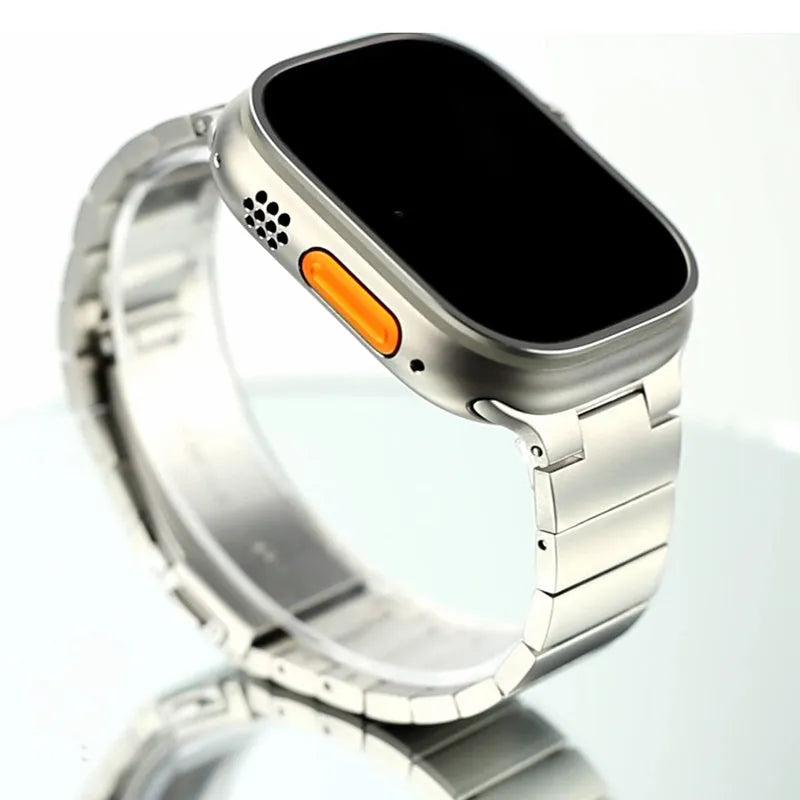 Stainless steel metal watch band for iWatch 38mm to 49mm in silver finish on table