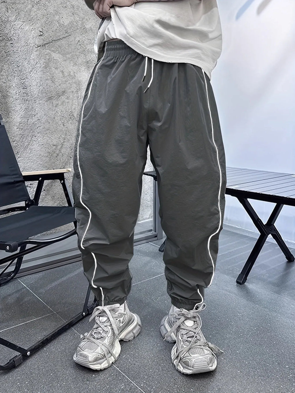 Men's loose fit casual sports trousers in bamboo fibre, shown in cropped length and a colour option like blue.