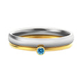 December colour birthstone engraved geometric ring in gold-tone titanium steel.