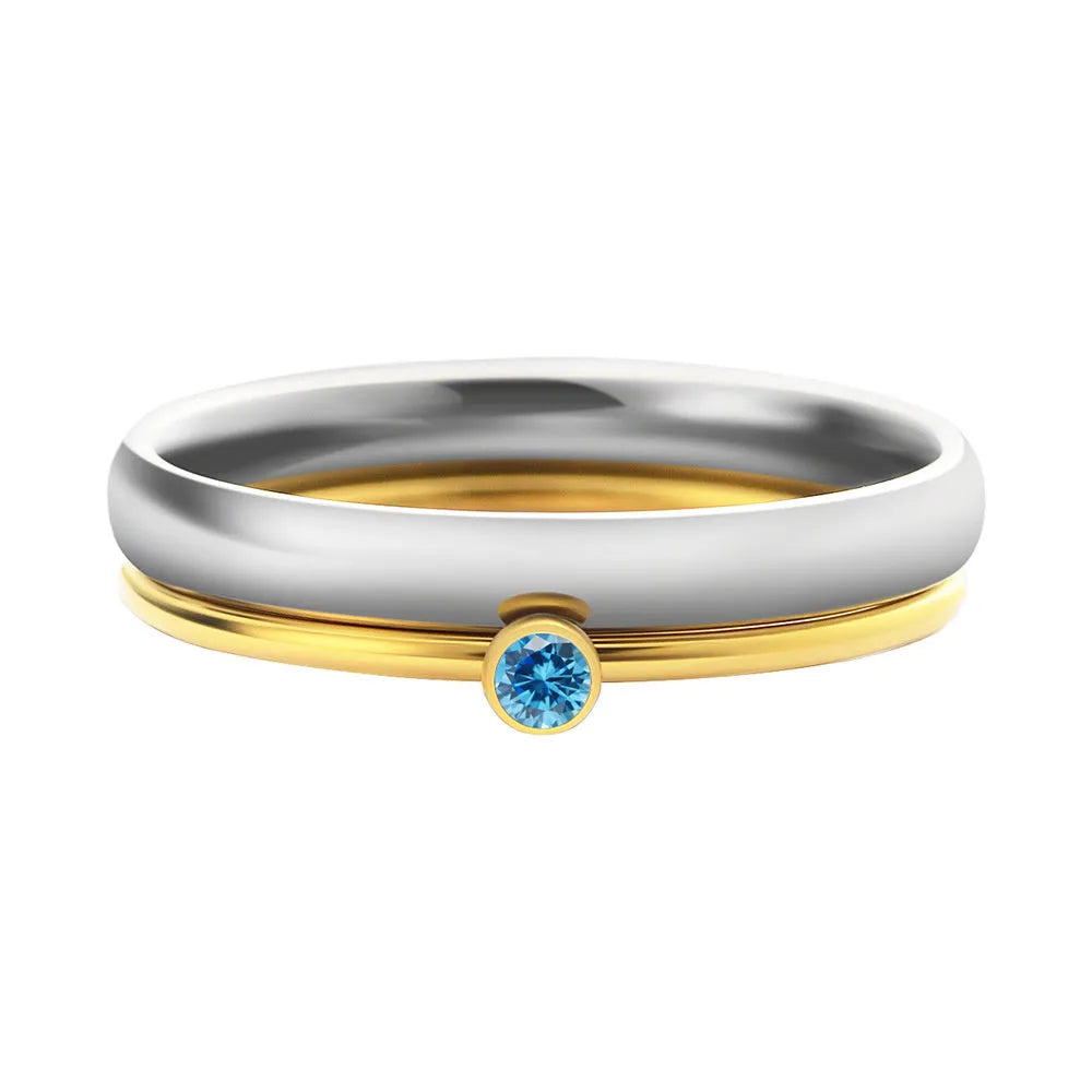 December colour birthstone engraved geometric ring in gold-tone titanium steel.