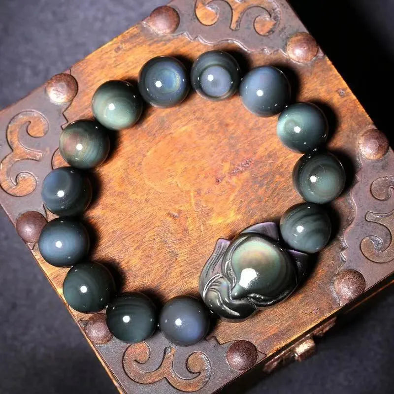 Obsidian carved fox couple bracelet showing animal zodiac design in cartoon style