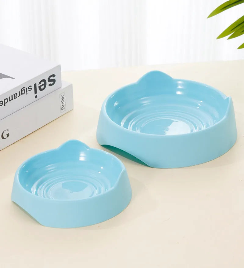 Blue ceramic dog slow feeder bowl with puzzle maze design for small or large breed dogs.