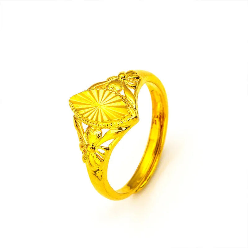 Geometric open flower ring with gold electroplated finish and textured brass surface