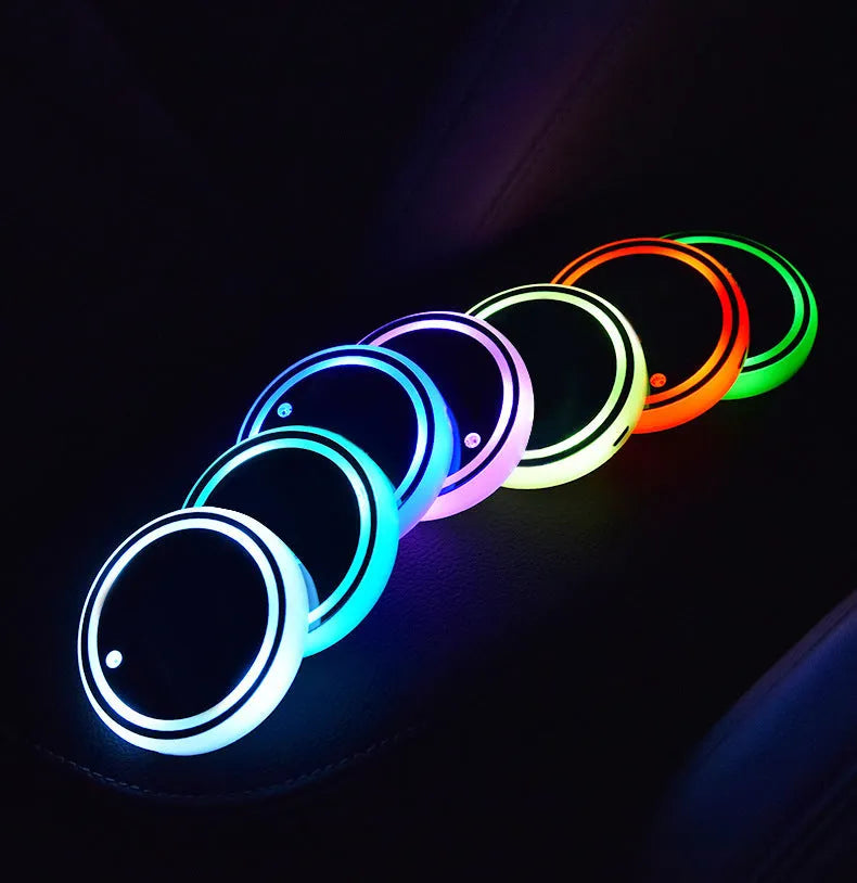 Colourful LED light-up coaster for car cup holder with USB cable and seven light colours.