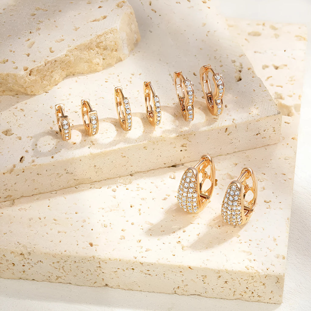 Brass gold plated heart shape zircon ear clip earrings with gang drill detailing on copper base