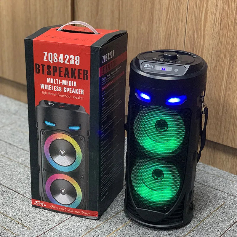 Black portable Bluetooth speaker with dual horn cannon design and USB charging port