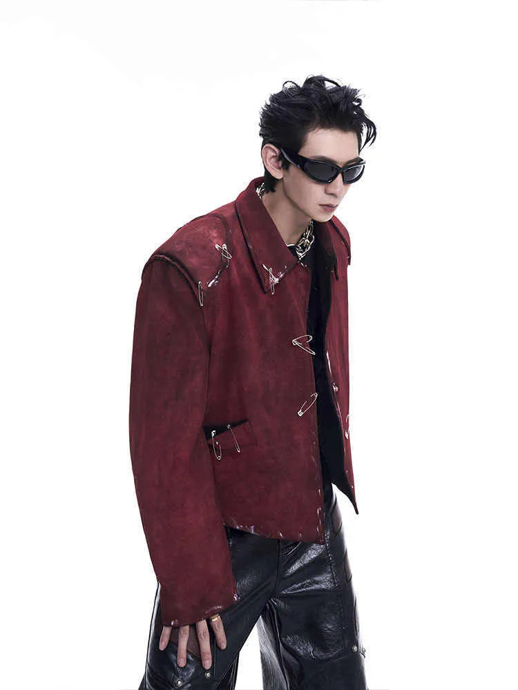 Men's red quilted jacket with decorative flocking pins and lapel collar