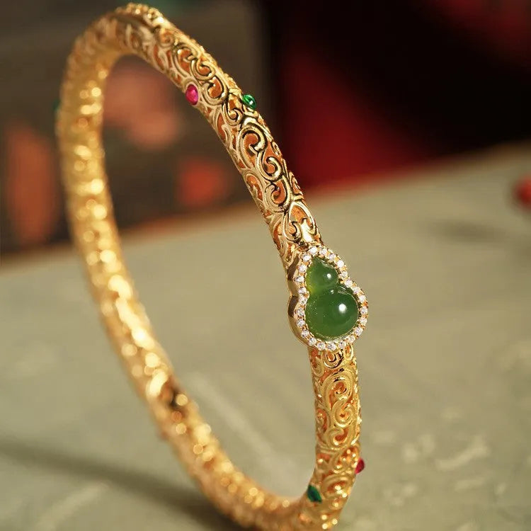 Gold-plated copper xiangyun gourd bracelet with adjustable silk cord for women