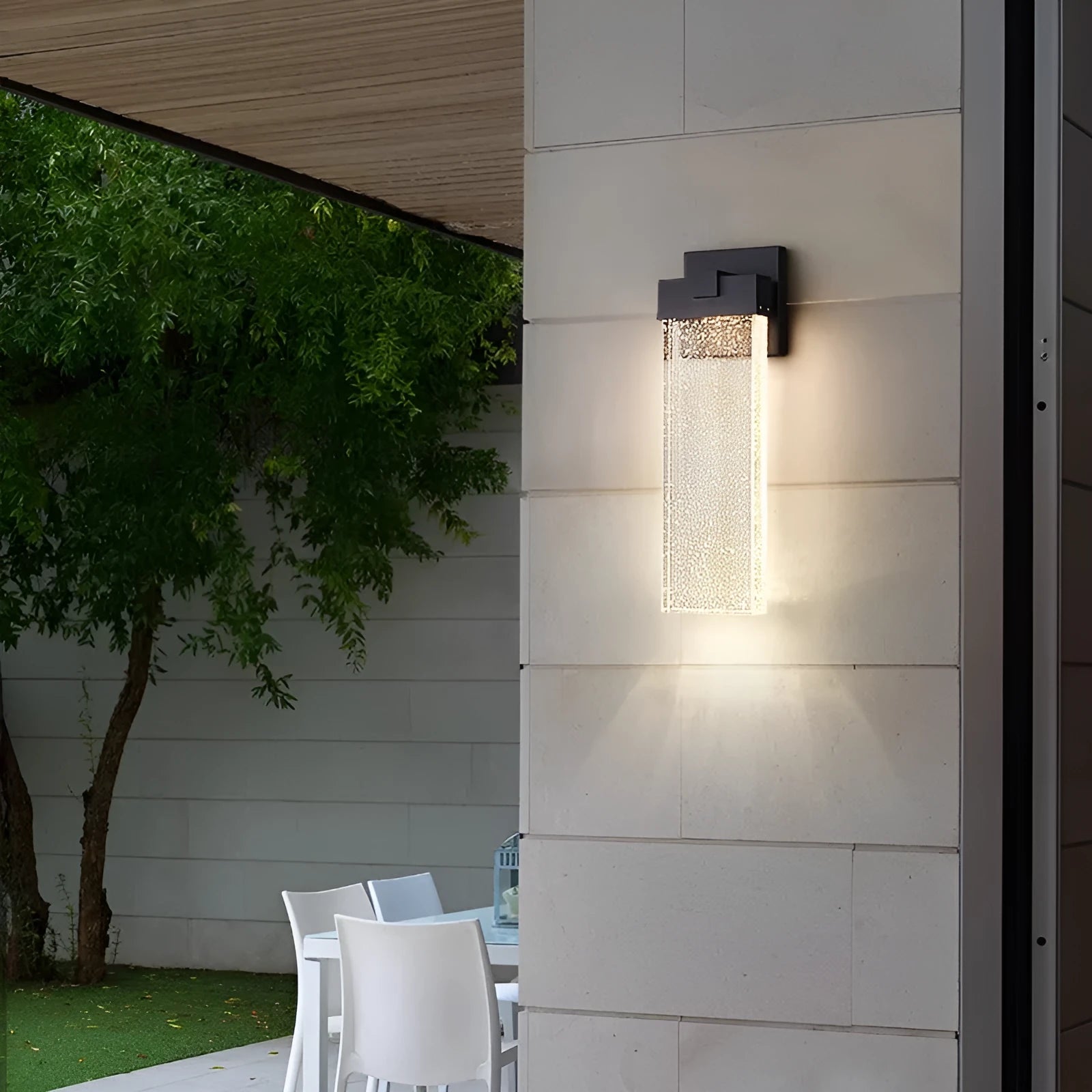 Black outdoor LED wall light with stainless steel shell, shown in large and small size options.