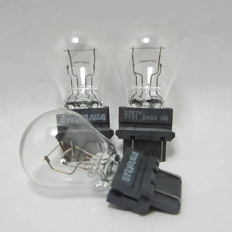 Wagner brake light bulb with dual wires, plastic alignment dots, and 16mm socket