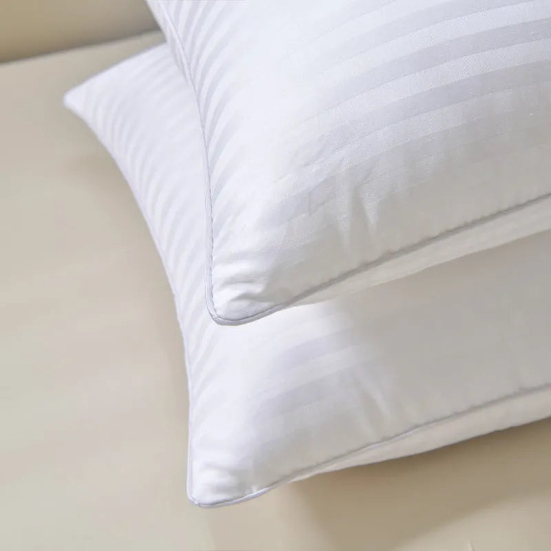 White cotton satin stripe feather pillow showing three size options and loft variations