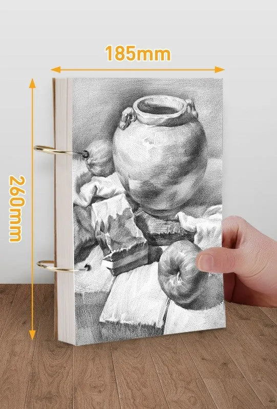 8K thickened sketchbook open showing coil binding and marker illustration on specialised paper