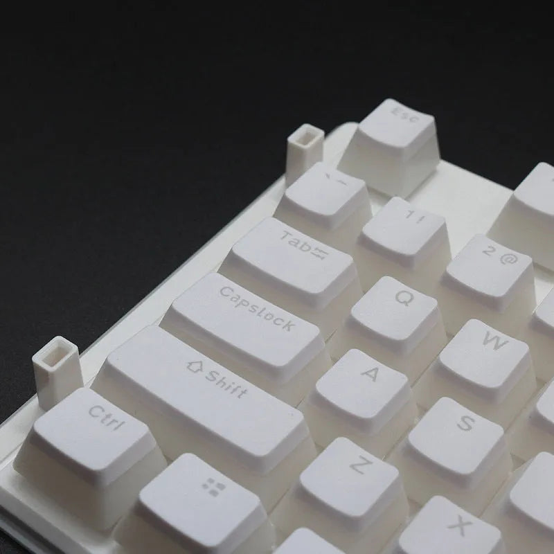 PBT pudding keycap set with translucent sides showing RGB lighting through 108 keys including UK ISO layout
