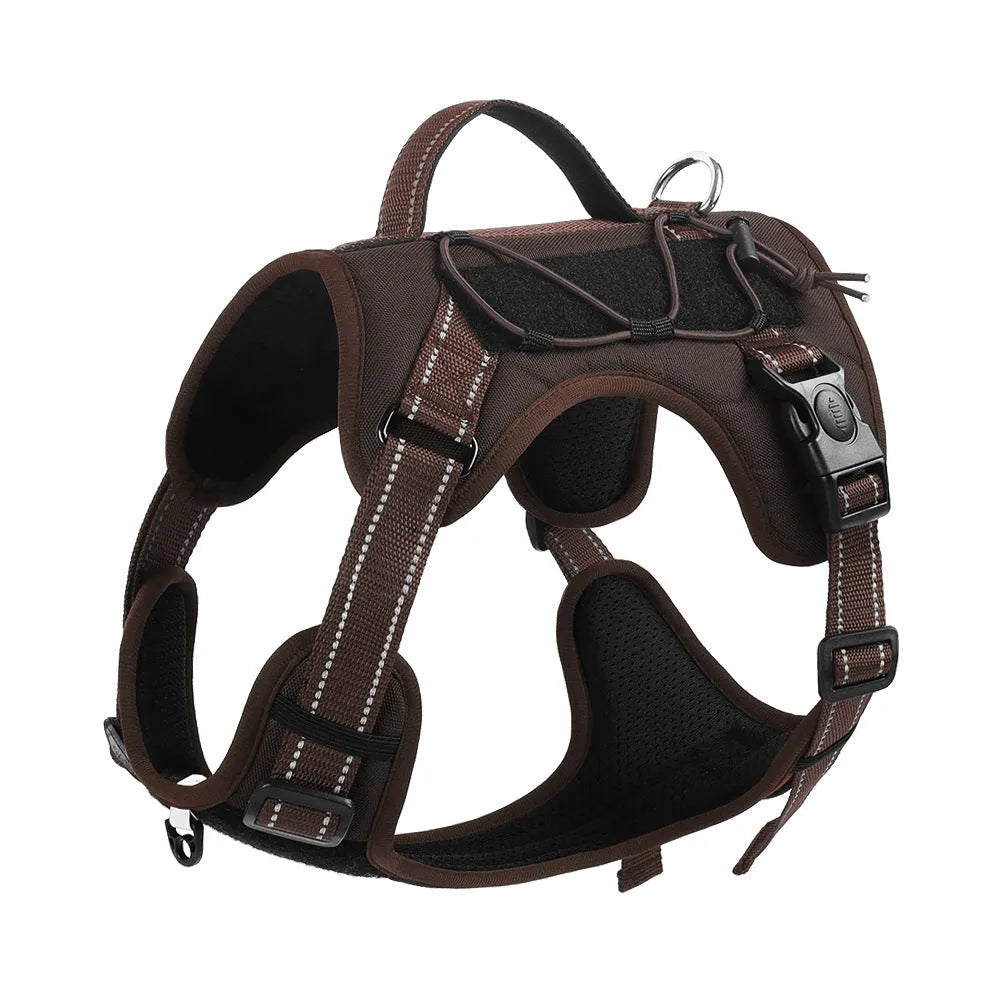 Orange reflective dog harness with padded chest strap and matching black rope lead laid flat.