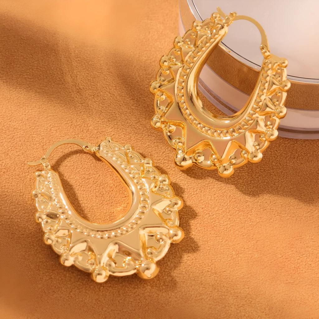 Stainless steel geometric hollow earrings in gold electroplated round shape for women fashion OL style